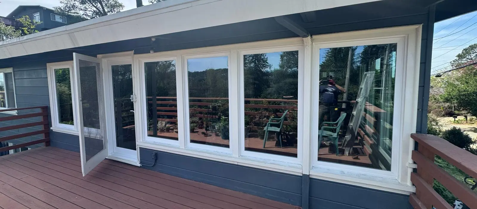 Picture windows and a multi-panel door Windows 4U installed on a deck-facing wall in the East Bay