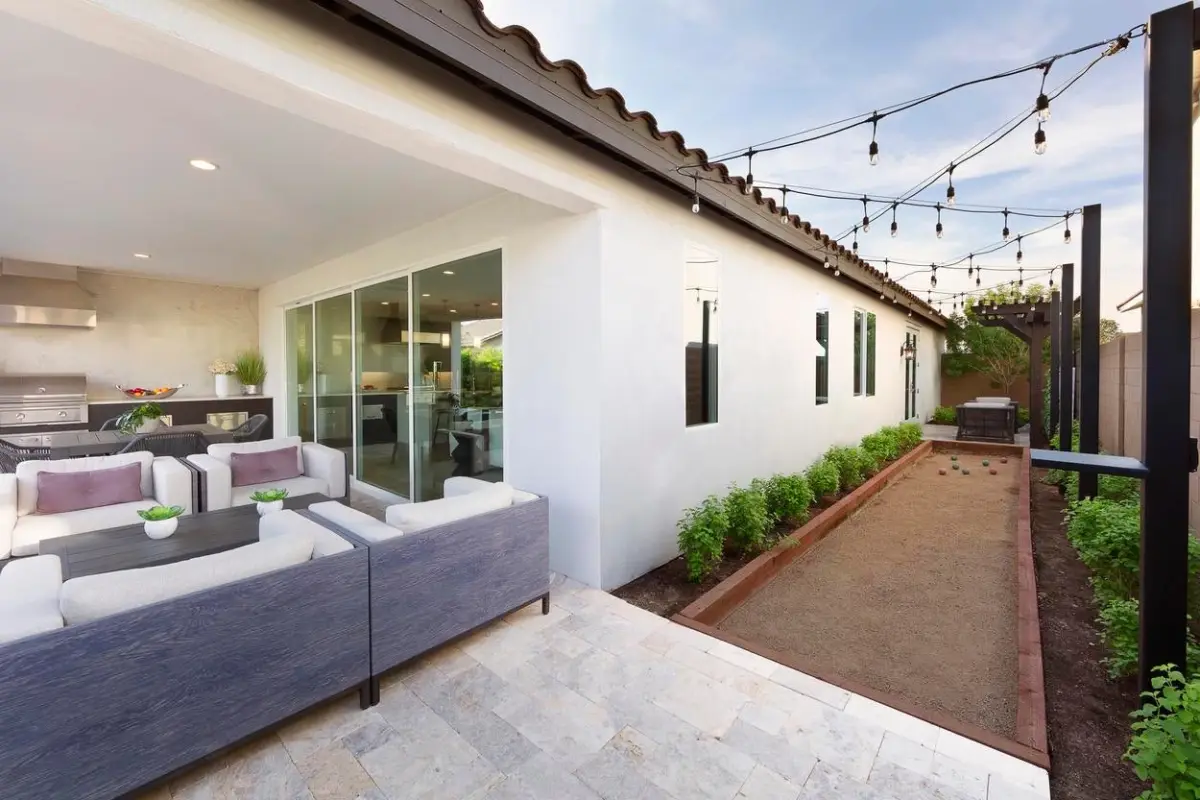 Milgard moving glass wall opening a living room to the patio