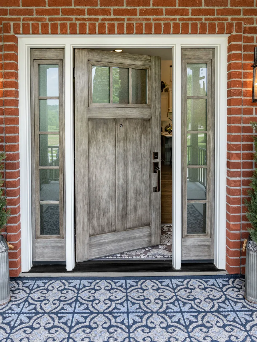 Brick entry with a ProVia Signet fiberglass door and sidelites