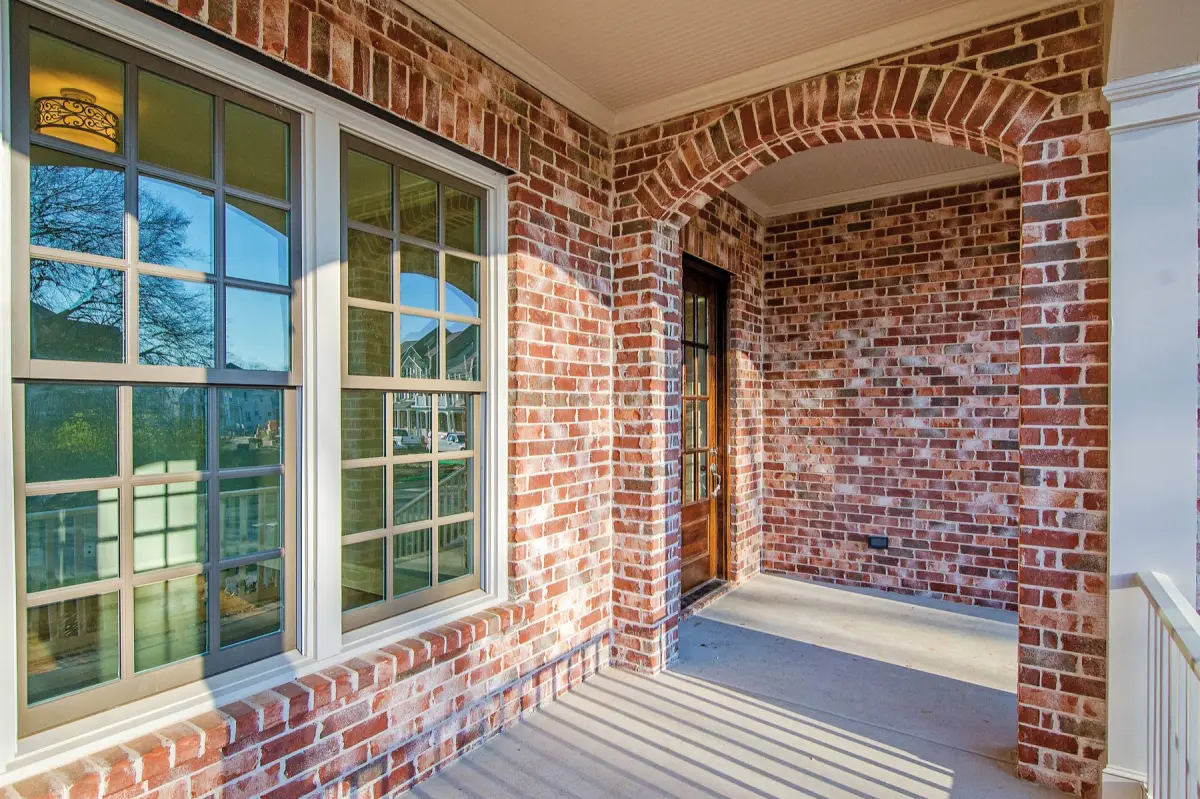 Brick home with Windsor Legend windows