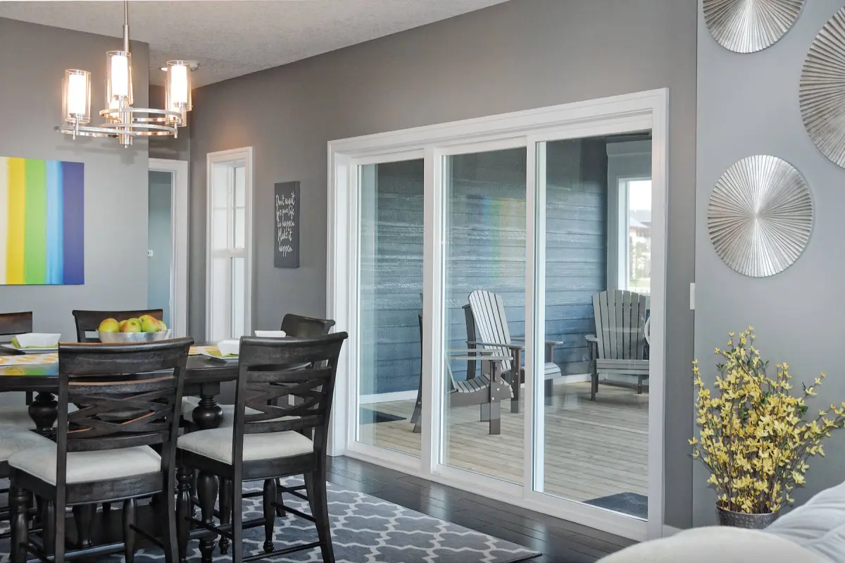 Dining room with Windsor Next Dimension windows and patio door