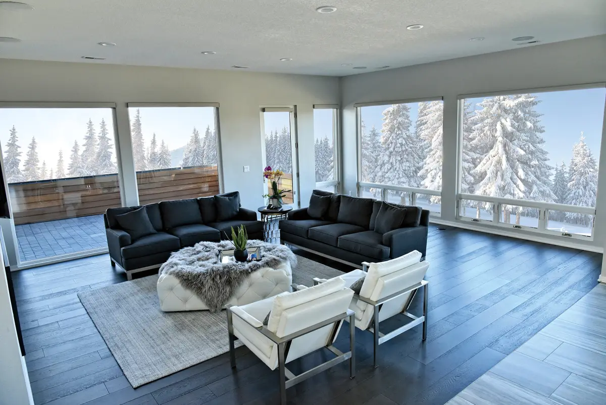 Living room with wood-clad windows