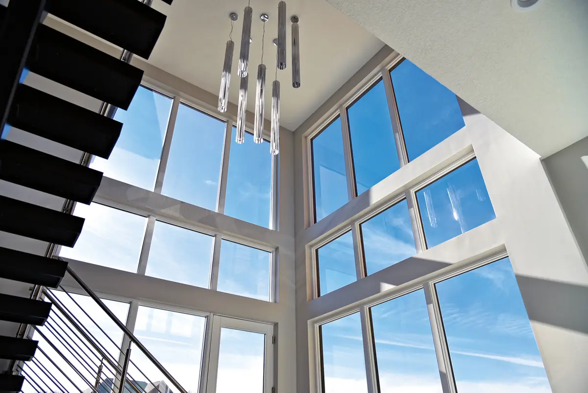 Home with large windows facing a view