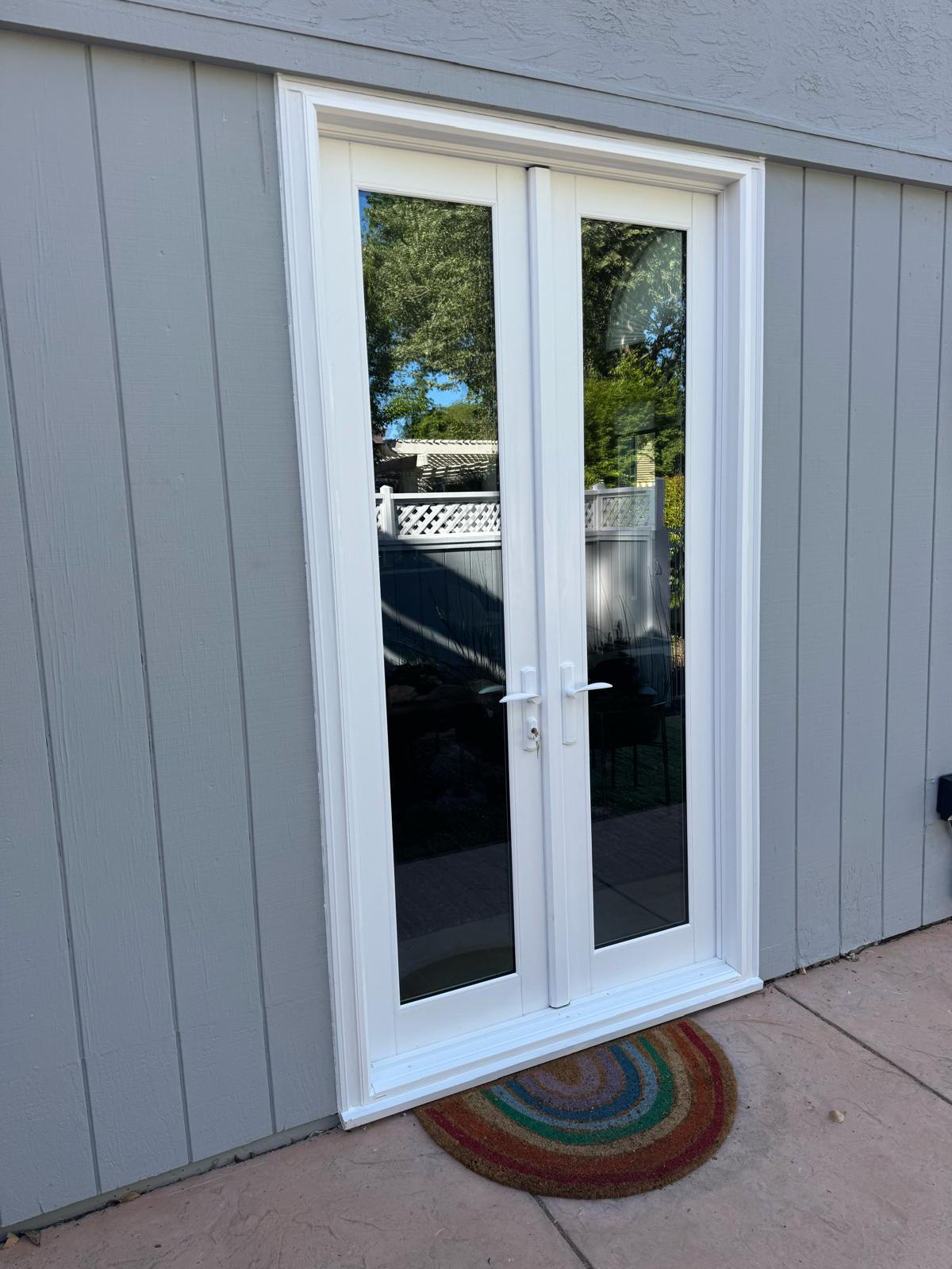 White full-lite French patio door installed on East Bay home