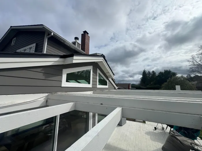 Clerestory awning windows installed along roofline, East Bay