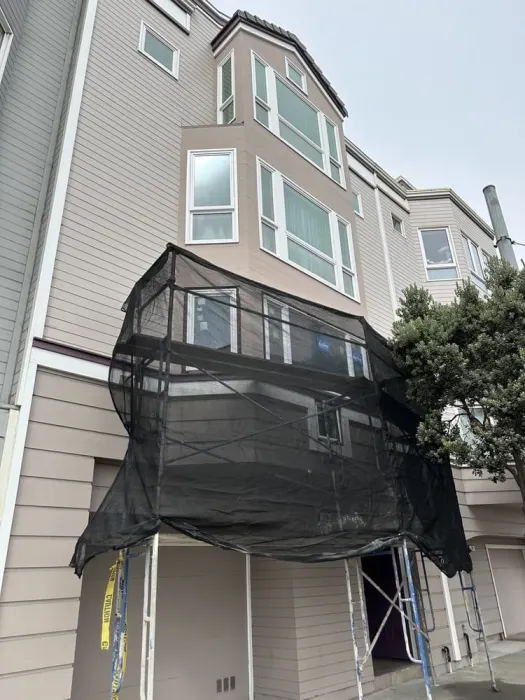 Multi-story residential building window replacement with scaffolding, Bay Area