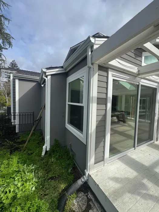 Sliding door system combined with single hung window installation, East Bay