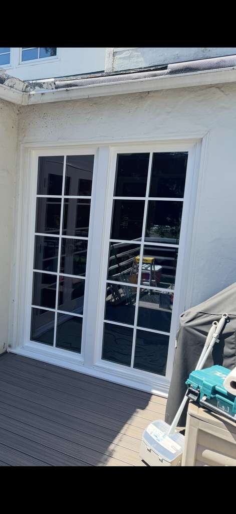 French patio door with grid pattern installed on deck, East Bay CA