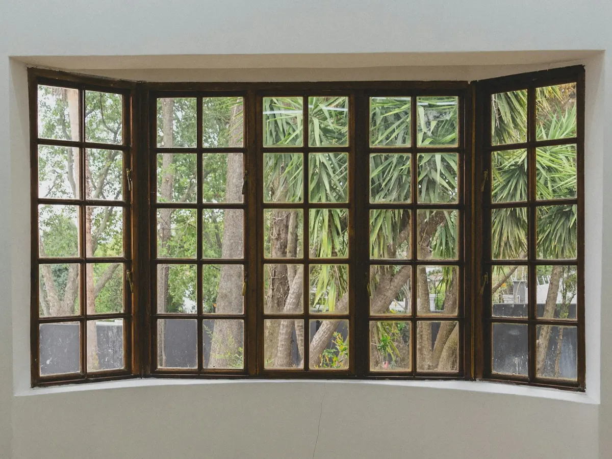 Wood bay window with divided lites