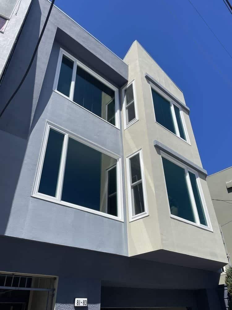Multi-story building with all-new vinyl windows, San Francisco Bay Area